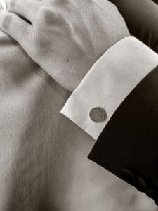 Arm of a man wearing a concrete cufflink